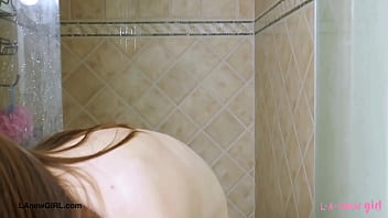 Gorgeous brunette model enjoys a sensual bath