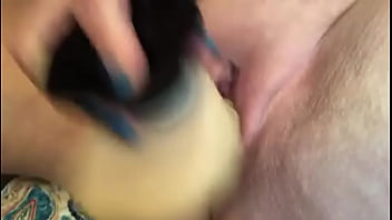 Masturbating