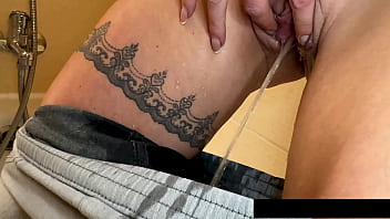 Claudia's playful bathroom selfie