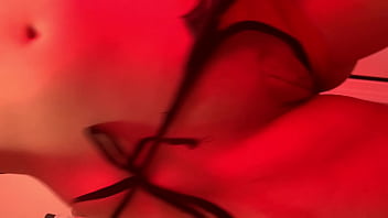 Sexy pink hair girl shows off body in halloween lingerie