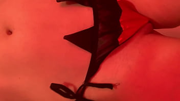 Sexy pink hair girl shows off body in halloween lingerie