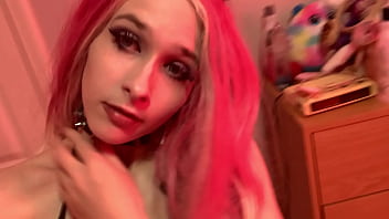 Sexy pink hair girl shows off body in halloween lingerie
