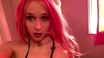 Sexy pink hair girl shows off body in halloween lingerie