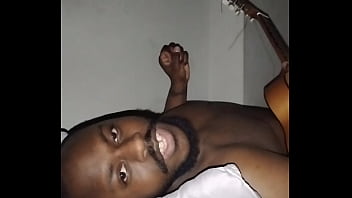 Translating other meanings of horns in the air while singing and playing guitar naked Translating other meanings of horns in the air while singing and playing guitar naked