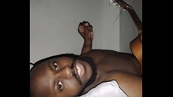 Translating other meanings of horns in the air while singing and playing guitar naked