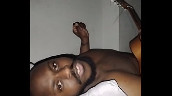 Translating other meanings of horns in the air while singing and playing guitar naked