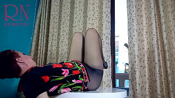 Nice lady in pantyhose and heels striptease at the round table 32