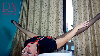 Nice lady in pantyhose and heels striptease at the round table 32