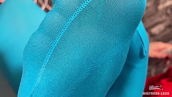 Long sexy legsand feet in blue nylons swings in a hanging chair above you