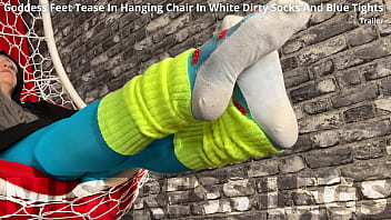 Long sexy legsand feet in blue nylons swings in a hanging chair above you