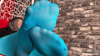 Long sexy legsand feet in blue nylons swings in a hanging chair above you