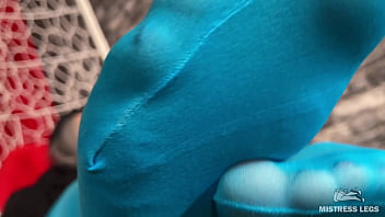 Long sexy legsand feet in blue nylons swings in a hanging chair above you