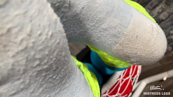 Long sexy legsand feet in blue nylons swings in a hanging chair above you