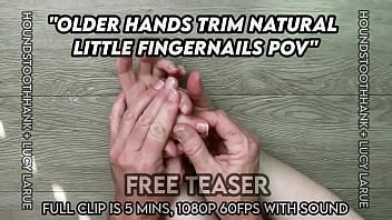 Older hands trim natural little fingernails pov