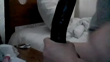 Practicing on a dildo