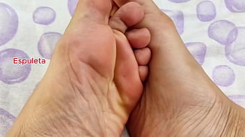 Naughty teen giving a footjob on her huge dildo