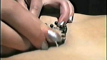 Tied up amateur slave girl gets pierced by mistress Tied up amateur slave girl gets pierced by mistress