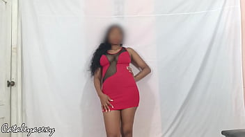 Big tits model posing in a sexy red dress