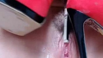 Cams amateur busty brunette playing with high heel shoes