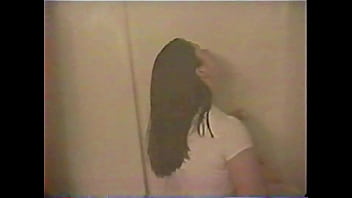 Busty brunette gets soaked in the shower