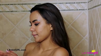 Stunning brunette model enjoys a sensual bath