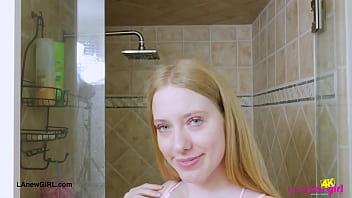 Blonde babe in bloom enjoys a sensual bath