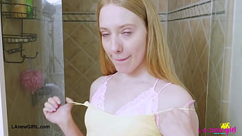 Blonde babe in bloom enjoys a sensual bath