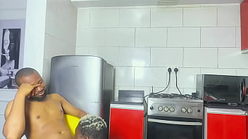Ebony slut sneaks in on her boss in the kitchen and grabs his big black cock