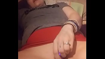 Sexy girl makes herself squirt with a purple dildo