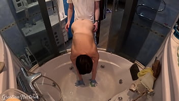 She was trying to clean the bath while i was fucking her