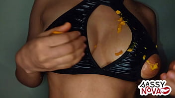 Sexy girl playing with mango