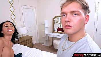 Huge breast brunette soaks the bed sheets with her two big boys