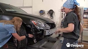 Two horny girls fuck in an auto repair garage Two horny girls fuck in an auto repair garage