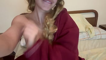 Cute natural girl in pajamas touches herself before going to study