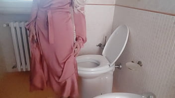 The warm pee of my stepmother dressed in elegant silk during a party