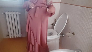 The warm pee of my stepmother dressed in elegant silk during a party
