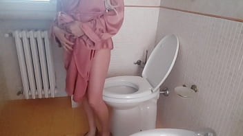 The warm pee of my stepmother dressed in elegant silk during a party