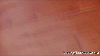 Redhead teasing in sexy lingerie