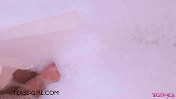 Stunning teen model enjoys a sensual bath