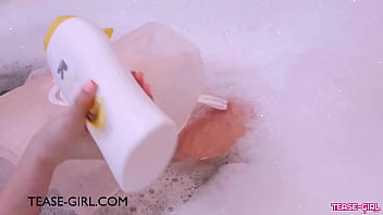 Stunning teen model enjoys a sensual bath