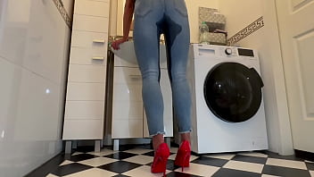 Desperate wetting my jeans and in my sexy red highheels and play with