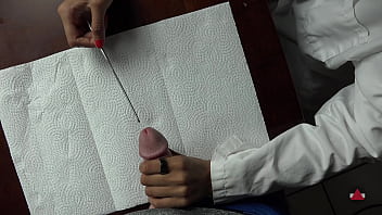 She grabs his dick and twangs it