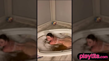 Huge boobs curvy mature milf strips and fingers her wet lil pussy in the bathtub