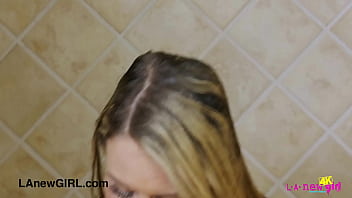 Dazzling light haired fashionista enjoys a sensual bath