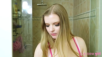 Fresh and radiant face blonde model enjoys a sensual bath