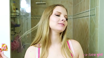 Fresh and radiant face blonde model enjoys a sensual bath