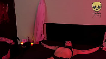 Dominatrix in intense session with her new submissive