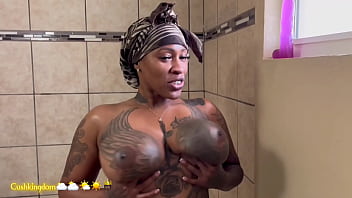 Sexy thick cuban shows off her tattoos then gets fucked in the shower doggy style