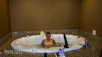 Petite blonde plays with huge bbc toy in the bath