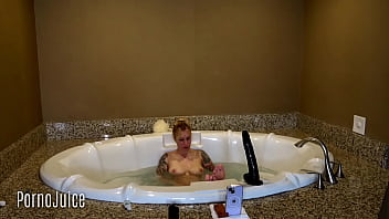 Petite blonde plays with huge bbc toy in the bath